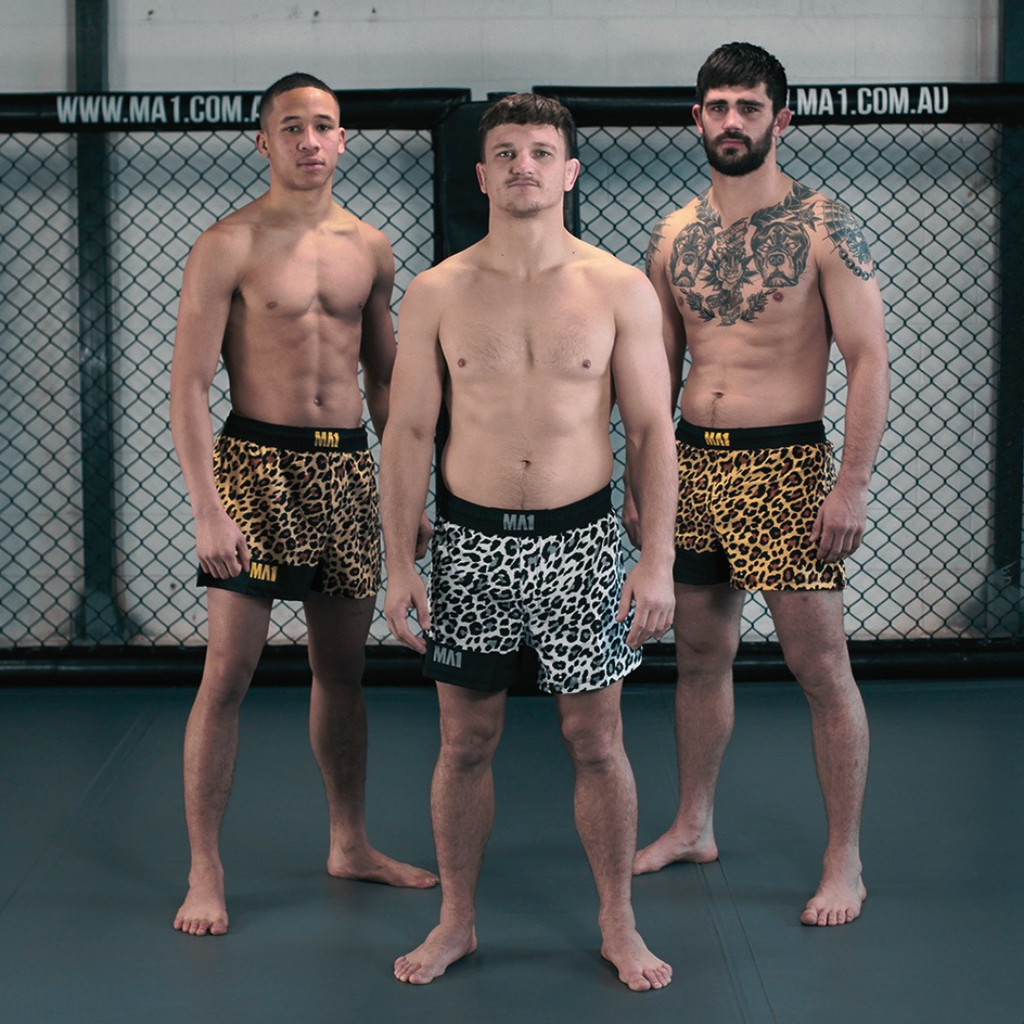 MA1 CRAIG JONES GOLD LEOPARD HIGH CUT MMA SHORTS