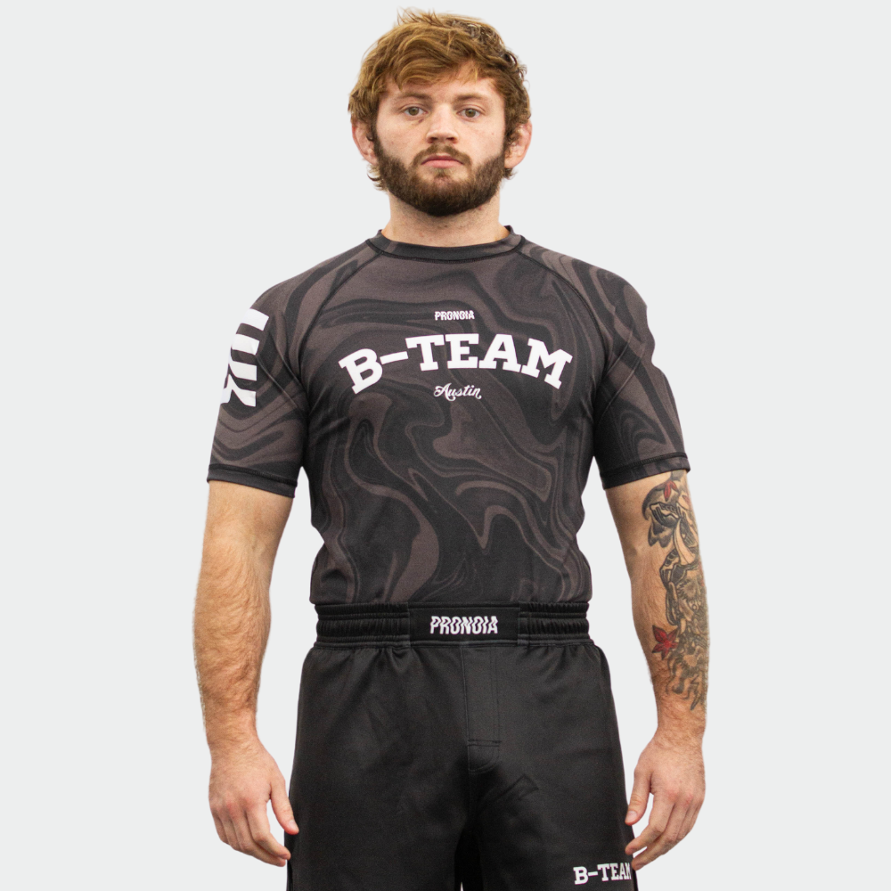 BTEAM X PRONOIA RASH GUARD BLACK(SIZING RUNS SMALL)