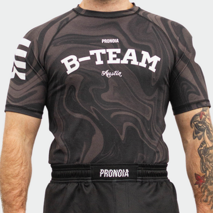 BTEAM X PRONOIA RASH GUARD BLACK(SIZING RUNS SMALL)