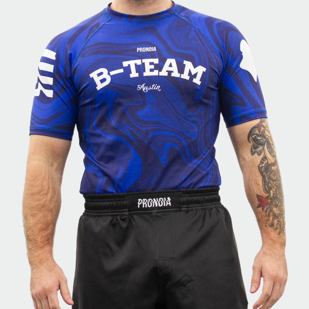 BTEAM X PRONOIA RASH GUARD BLUE(SIZING RUNS SMALL)