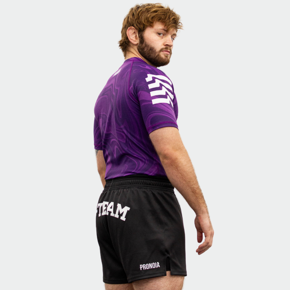 BTEAM X PRONOIA RASH GUARD PURPLE(SIZING RUNS SMALL)