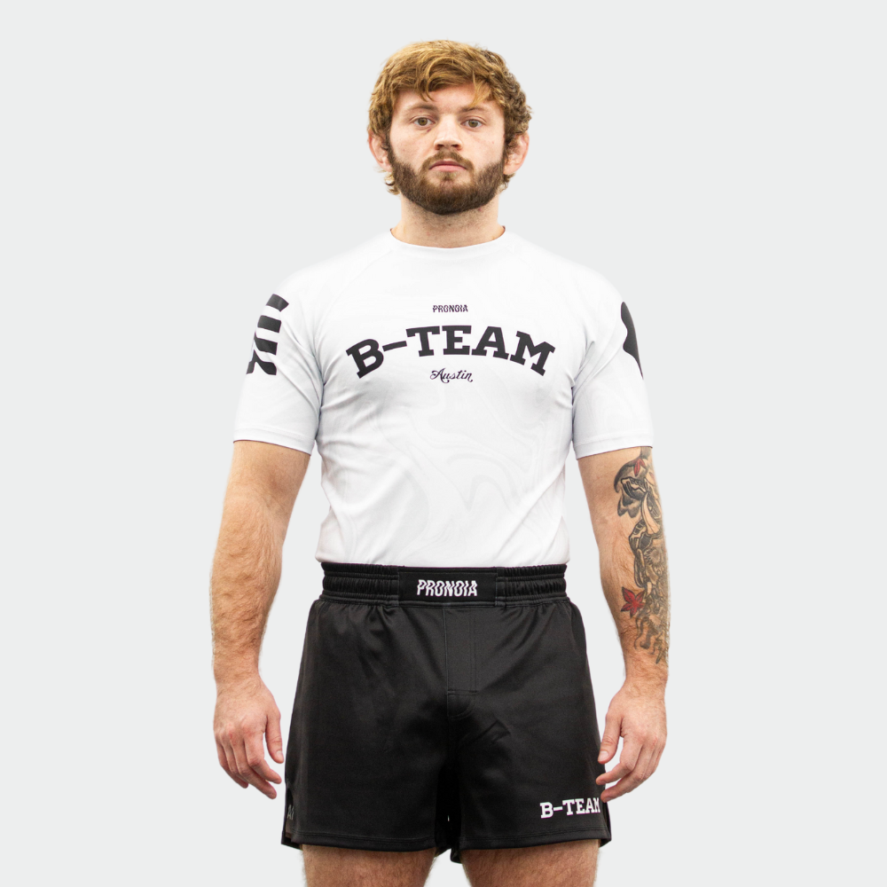 BTEAM X PRONOIA RASH GUARD WHITE (SIZING RUNS SMALL)